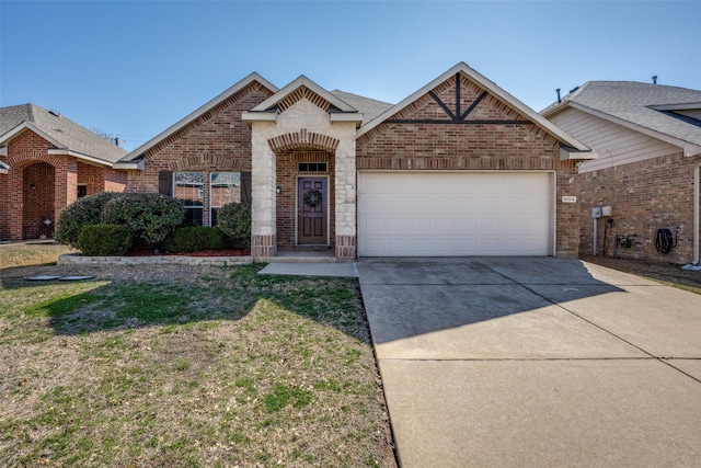 5104 Pebble Beach Trl, Denton, TX 76208 - view of front facade with concrete driveway, a garage, brick siding, and a front lawn