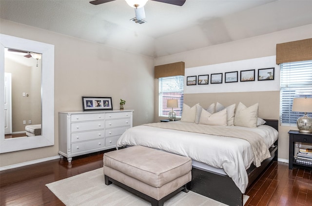 5104 Pebble Beach Trl, Denton, TX 76208 - bedroom featuring dark wood-type flooring, vaulted ceiling, and a ceiling fan