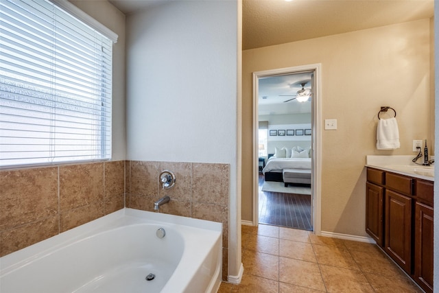 5104 Pebble Beach Trl, Denton, TX 76208 - full bathroom featuring ensuite bathroom, a garden tub, vanity, tile patterned flooring, and ceiling fan