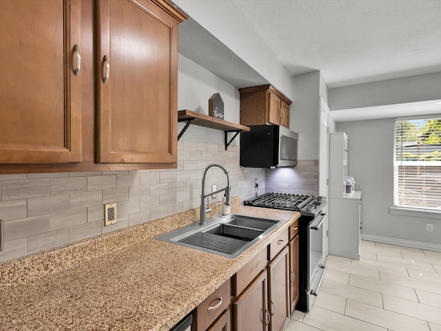 6708 Wagonet Rd, Forest Hill, TX 76140 - kitchen featuring stainless steel appliances, open shelves, tasteful backsplash, brown cabinets, and light stone countertops