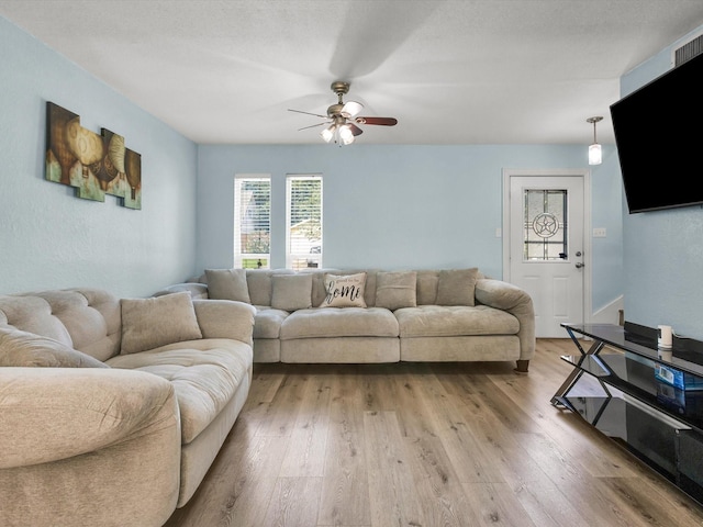 6708 Wagonet Rd, Forest Hill, TX 76140 - living area with a ceiling fan and light wood-type flooring