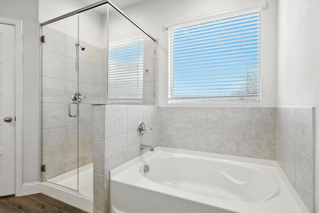 260 Clairmont Dr, Ponder, TX 76259 - full bathroom with a bath, a stall shower, and plenty of natural light