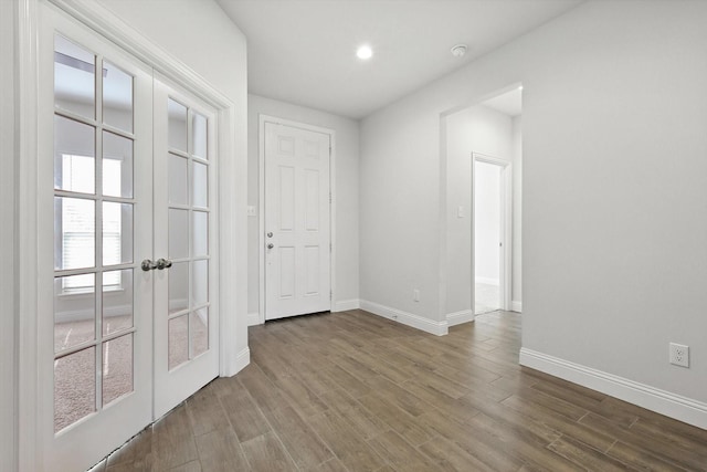260 Clairmont Dr, Ponder, TX 76259 - spare room featuring french doors, wood finished floors, and recessed lighting