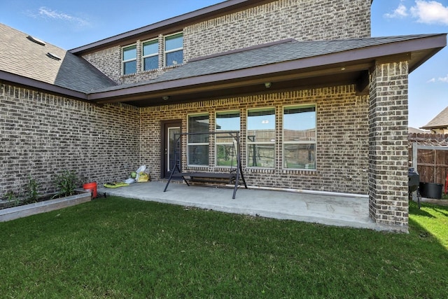 260 Clairmont Dr, Ponder, TX 76259 - entrance to property with a yard, brick siding, and a patio area