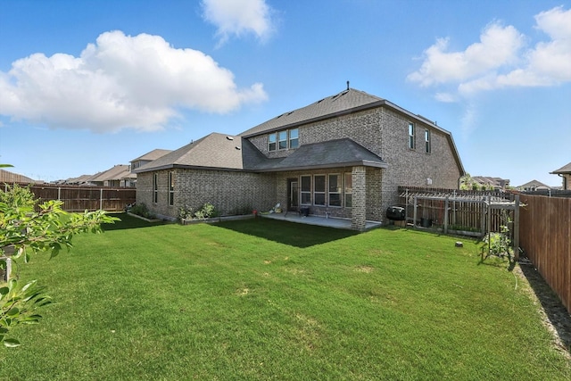 260 Clairmont Dr, Ponder, TX 76259 - rear view of house with brick siding, a patio, and a fenced backyard