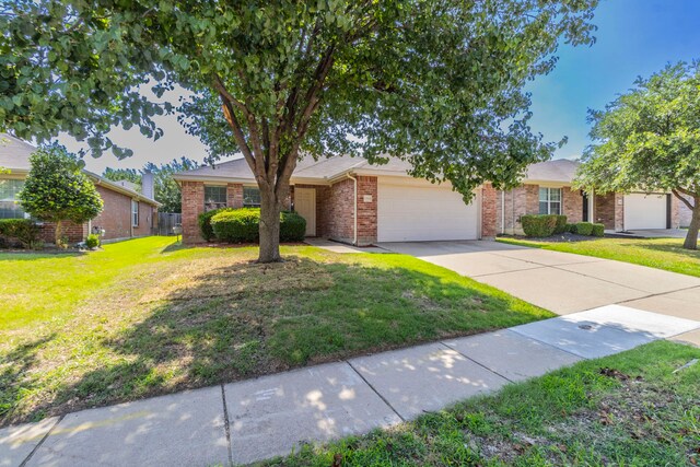 13264 Harvest Ridge Rd, Fort Worth, TX 76244 - view of front facade with an attached garage, brick siding, a front yard, and concrete driveway