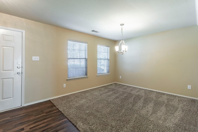 13264 Harvest Ridge Rd, Fort Worth, TX 76244 - empty room featuring dark wood-style floors and a chandelier