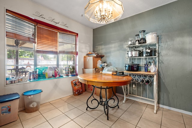 2200 SE 26th Ave, Mineral Wells, TX 76067 - tiled dining room with a chandelier and baseboards