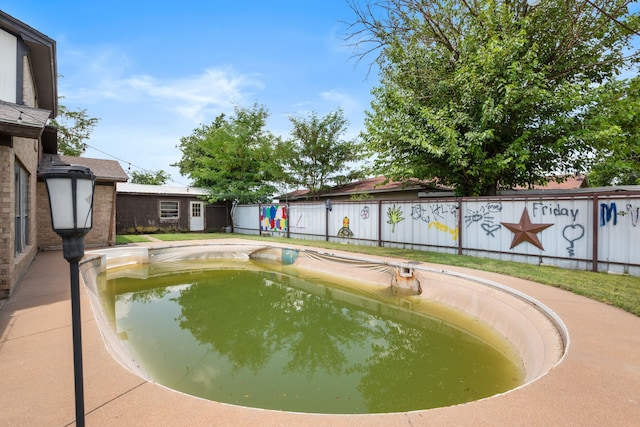 2200 SE 26th Ave, Mineral Wells, TX 76067 - view of swimming pool featuring a fenced backyard