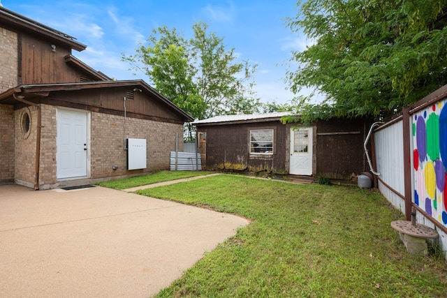 2200 SE 26th Ave, Mineral Wells, TX 76067 - rear view of property featuring brick siding and an outdoor structure