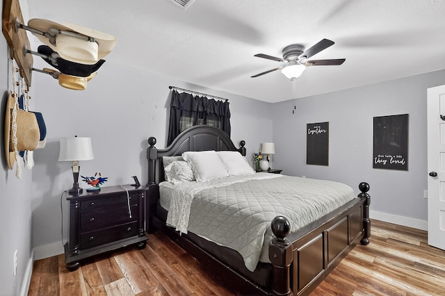 1008 County Road 4759, Sulphur Springs, TX 75482 - bedroom featuring wood finished floors and a ceiling fan