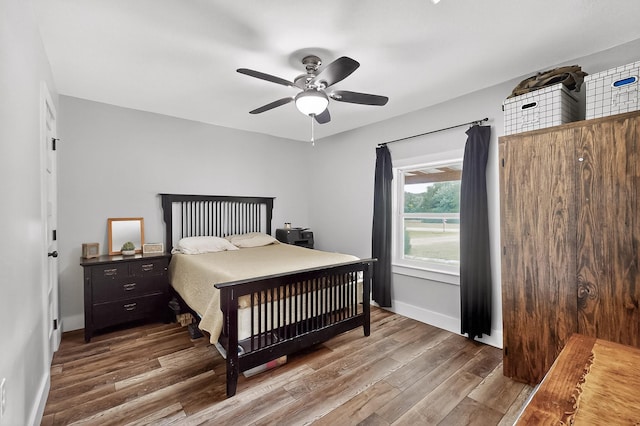 1008 County Road 4759, Sulphur Springs, TX 75482 - bedroom featuring wood finished floors and ceiling fan