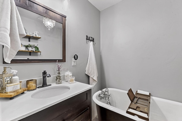 1008 County Road 4759, Sulphur Springs, TX 75482 - bathroom with a freestanding bath, vanity, and a chandelier