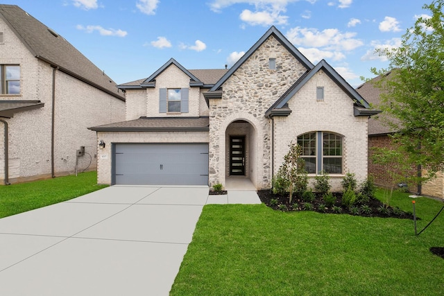 6217 Escarpment Dr, Fort Worth, TX 76112 - french country style house featuring driveway, a front lawn, and a garage