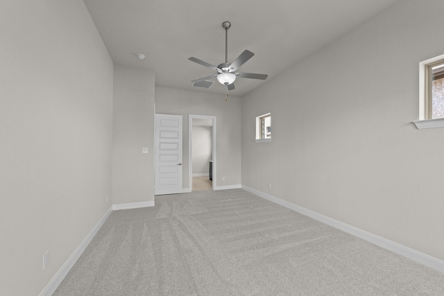 6217 Escarpment Dr, Fort Worth, TX 76112 - unfurnished bedroom with carpet flooring, a walk in closet, and ceiling fan