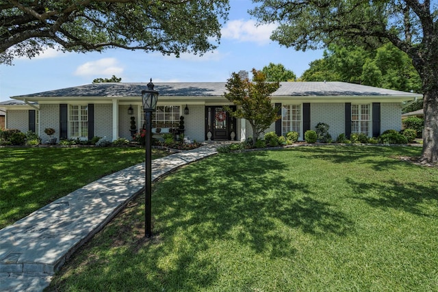 7116 Serrano Dr, Benbrook, TX 76126 - ranch-style house featuring brick siding and a front yard
