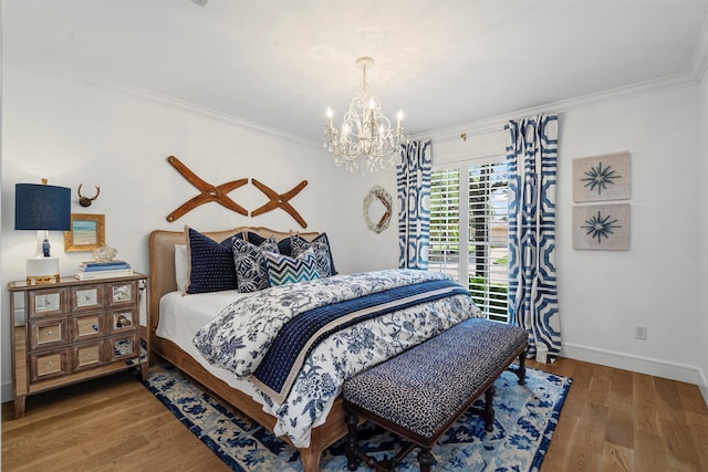 7116 Serrano Dr, Benbrook, TX 76126 - bedroom featuring crown molding, a chandelier, wood finished floors, and access to outside