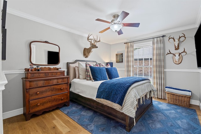 7116 Serrano Dr, Benbrook, TX 76126 - bedroom with crown molding, wood finished floors, and ceiling fan