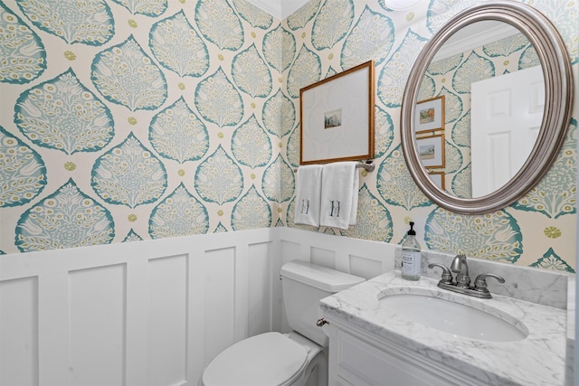 7116 Serrano Dr, Benbrook, TX 76126 - half bathroom with wallpapered walls, a wainscoted wall, vanity, and a decorative wall