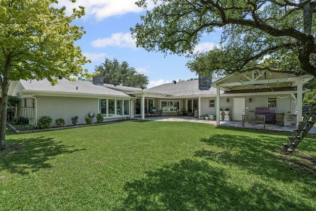 7116 Serrano Dr, Benbrook, TX 76126 - rear view of house featuring a patio, a yard, and brick siding