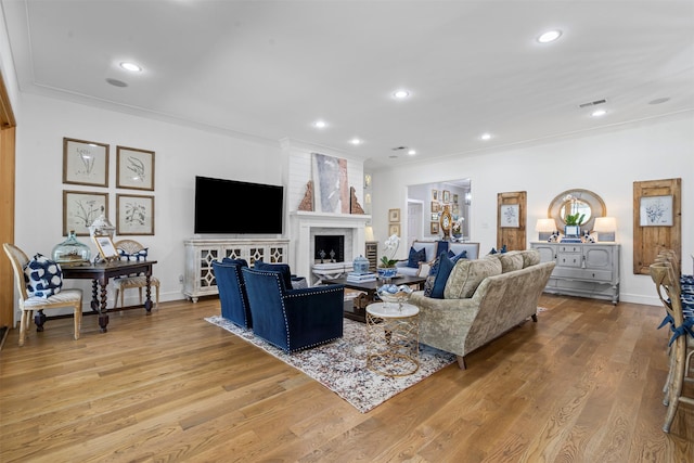 7116 Serrano Dr, Benbrook, TX 76126 - living room with wood finished floors, recessed lighting, and a fireplace