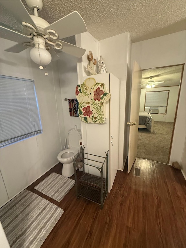 122 Vz County Road 3735, Wills Point, TX 75169 - bathroom with ceiling fan, wood finished floors, a textured ceiling, and cooling unit