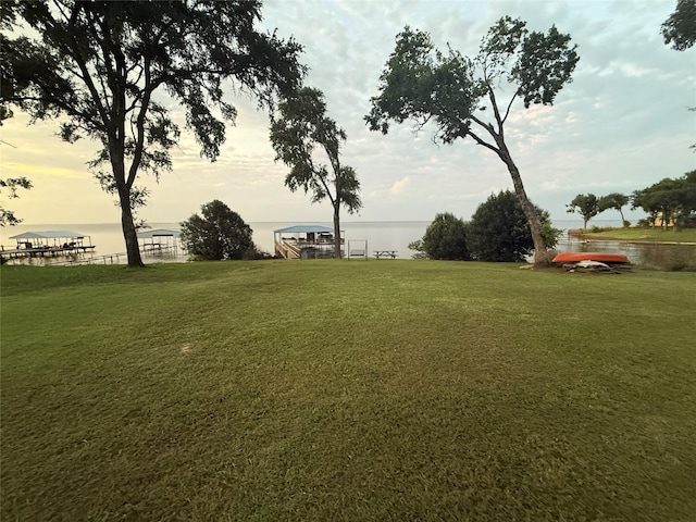 122 Vz County Road 3735, Wills Point, TX 75169 - view of green lawn featuring a water view