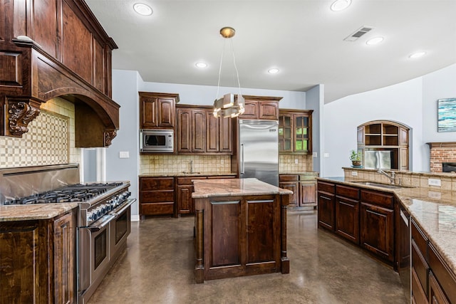 2001 Oak View Ct, Cross Roads, TX 76227 - kitchen with built in appliances, finished concrete floors, decorative backsplash, and recessed lighting