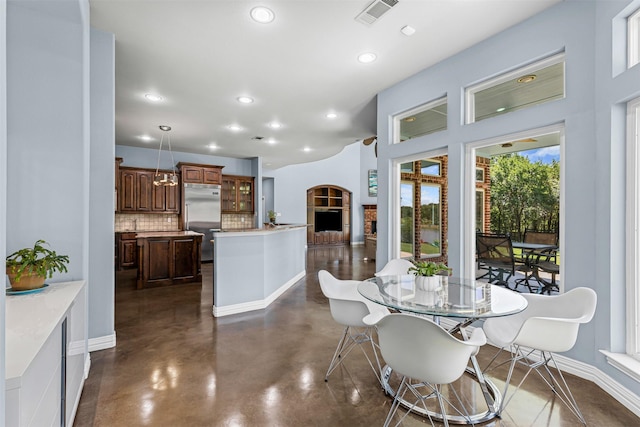 2001 Oak View Ct, Cross Roads, TX 76227 - dining space with recessed lighting and concrete floors