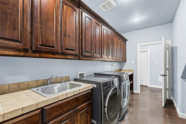 2001 Oak View Ct, Cross Roads, TX 76227 - laundry area with washing machine and dryer and cabinet space