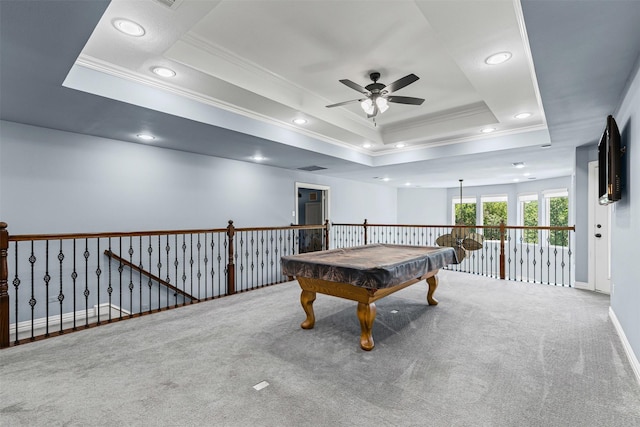 2001 Oak View Ct, Cross Roads, TX 76227 - rec room with ornamental molding, a tray ceiling, a ceiling fan, recessed lighting, and carpet flooring