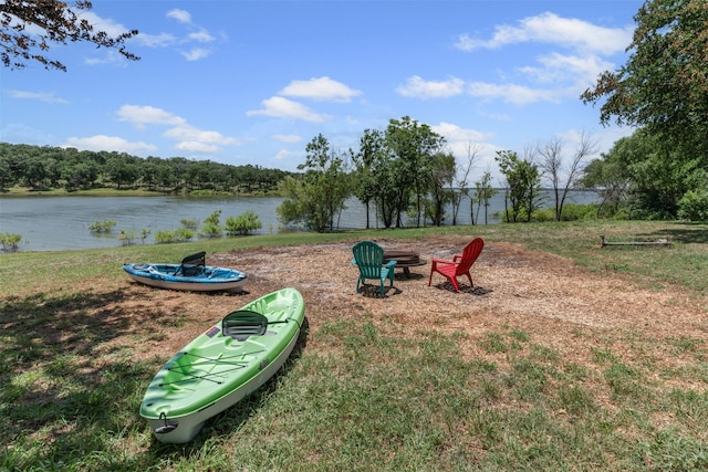2001 Oak View Ct, Cross Roads, TX 76227 - view of grassy yard featuring an outdoor fire pit and a water view