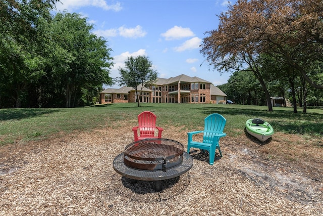2001 Oak View Ct, Cross Roads, TX 76227 - view of green lawn with an outdoor fire pit