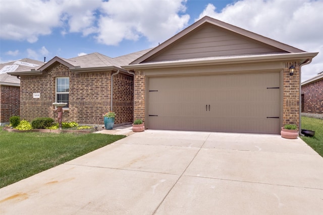 4319 Pyramid Dr, Forney, TX 75126 - ranch-style house featuring brick siding, concrete driveway, a garage, and a front yard