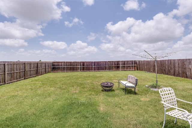 4319 Pyramid Dr, Forney, TX 75126 - fenced backyard with an outdoor fire pit
