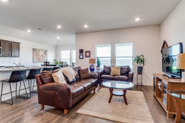 4319 Pyramid Dr, Forney, TX 75126 - living room with dark wood-type flooring and recessed lighting