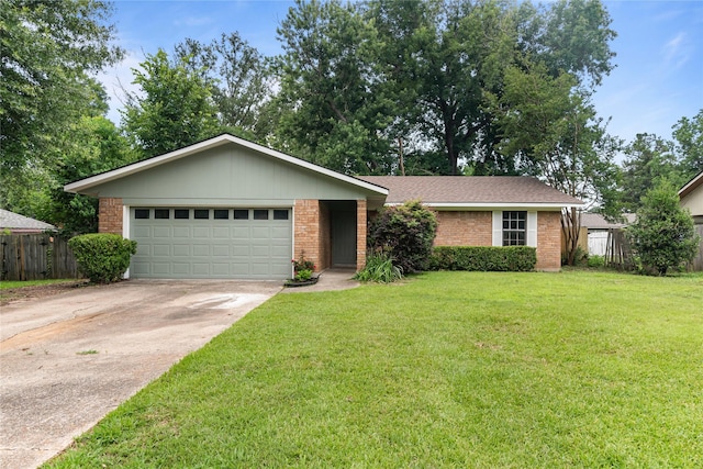 9709 Monticello Dr, Shreveport, LA 71118 - view of front facade featuring brick siding, concrete driveway, and a garage