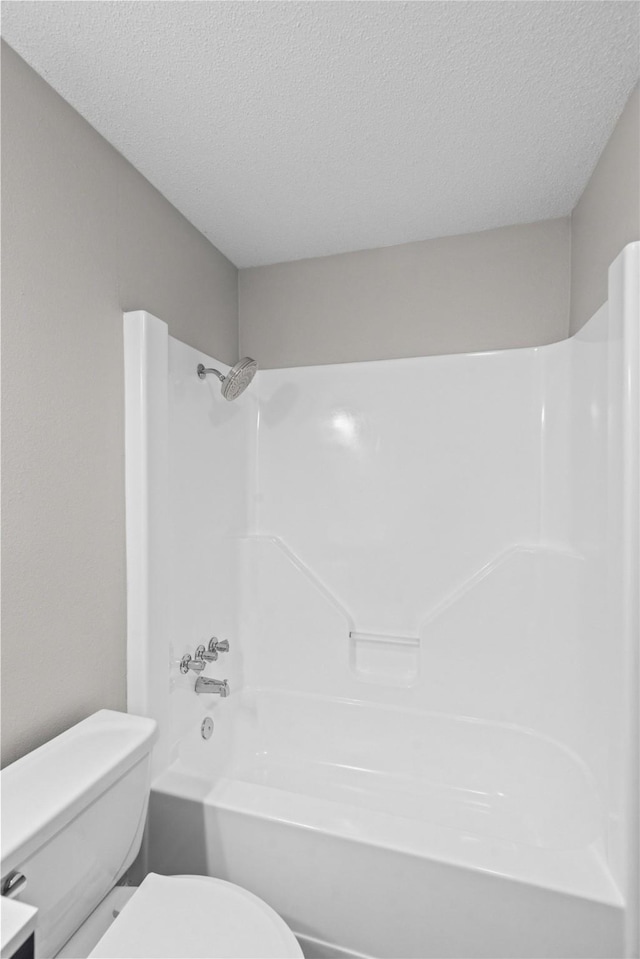 9709 Monticello Dr, Shreveport, LA 71118 - bathroom with a textured ceiling and bathtub / shower combination