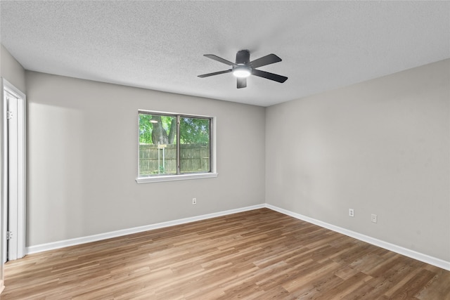 9709 Monticello Dr, Shreveport, LA 71118 - unfurnished room with light wood-type flooring, a ceiling fan, and a textured ceiling