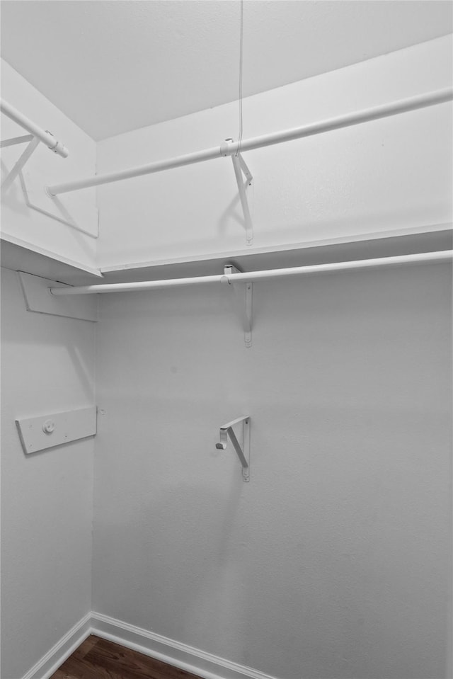 9709 Monticello Dr, Shreveport, LA 71118 - spacious closet with dark wood finished floors