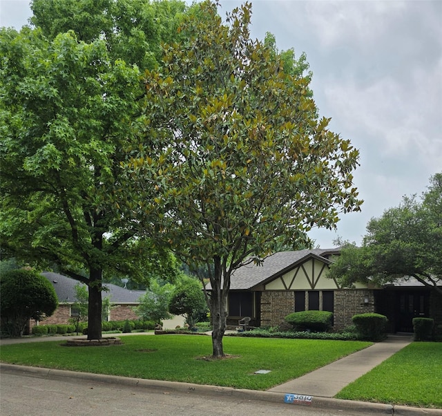 3810 Lucena Ct, Grand Prairie, TX 75052 - view of front facade with a front yard