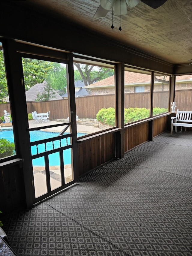 3810 Lucena Ct, Grand Prairie, TX 75052 - unfurnished sunroom featuring carpet flooring and a ceiling fan