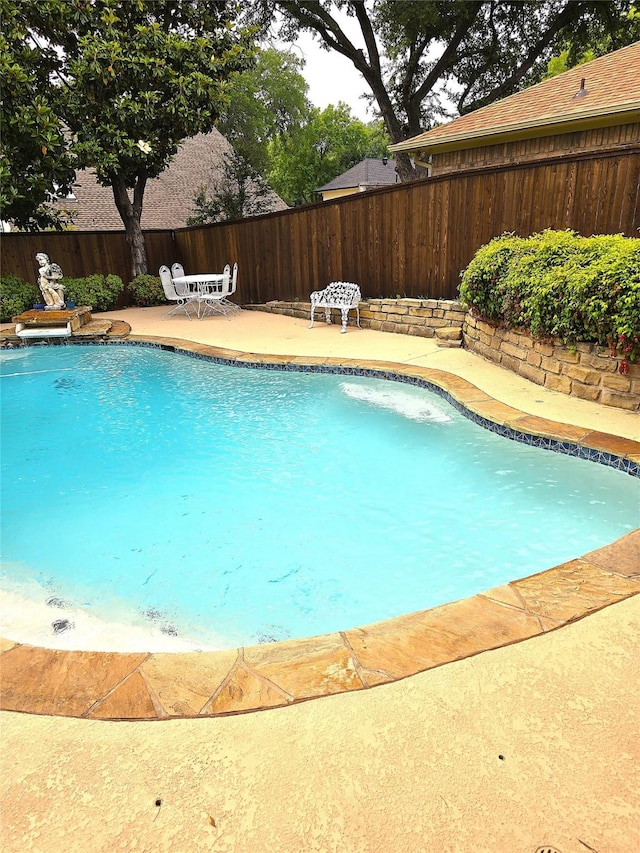 3810 Lucena Ct, Grand Prairie, TX 75052 - view of swimming pool with a fenced backyard and a patio area