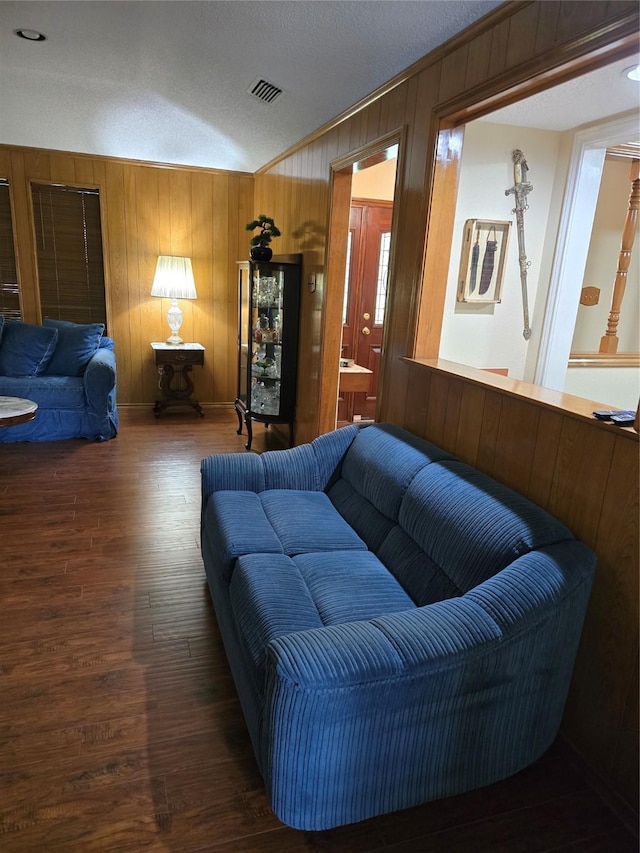3810 Lucena Ct, Grand Prairie, TX 75052 - living room featuring wood finished floors and wooden walls