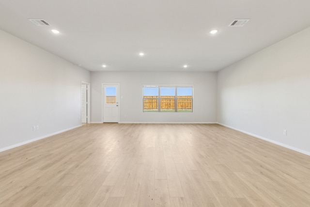 535 Forest Hvn, Van Alstyne, TX 75495 - empty room with light wood-style floors and recessed lighting