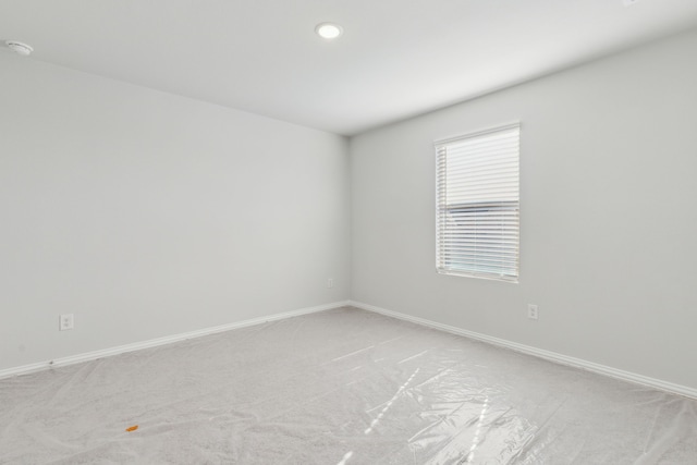 535 Forest Hvn, Van Alstyne, TX 75495 - empty room featuring light carpet, a smoke detector, and recessed lighting