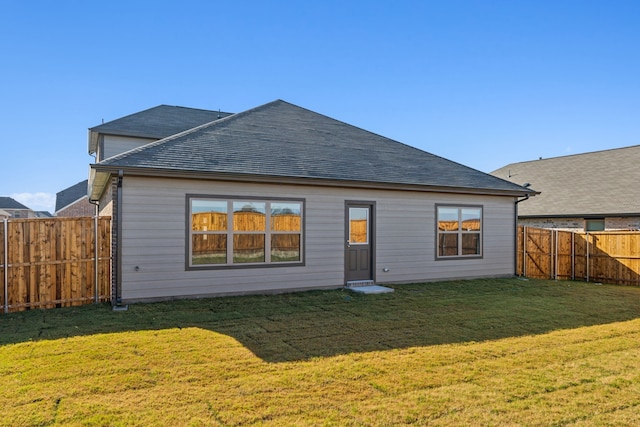 535 Forest Hvn, Van Alstyne, TX 75495 - rear view of property with a fenced backyard and roof with shingles
