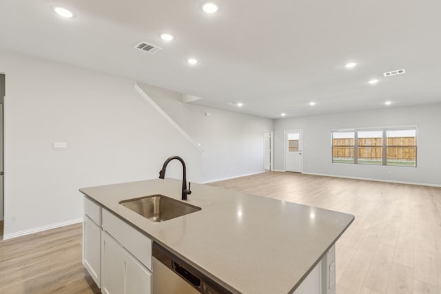 535 Forest Hvn, Van Alstyne, TX 75495 - kitchen with light wood-style flooring, recessed lighting, a kitchen island with sink, white cabinets, and open floor plan