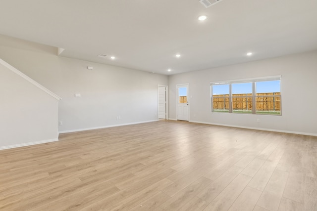 535 Forest Hvn, Van Alstyne, TX 75495 - spare room featuring light wood-type flooring and recessed lighting