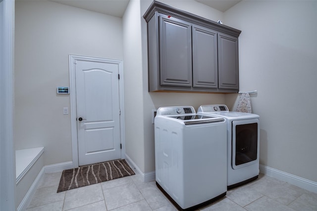 11100 Tanager Ln, Cross Roads, TX 76227 - laundry room with cabinet space, independent washer and dryer, and light tile patterned floors